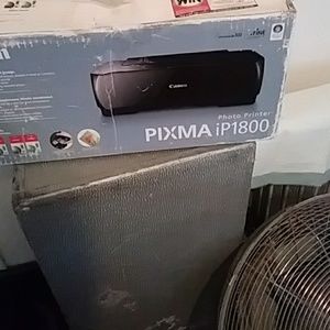 A photo printer pixma 1800 brand new never used...